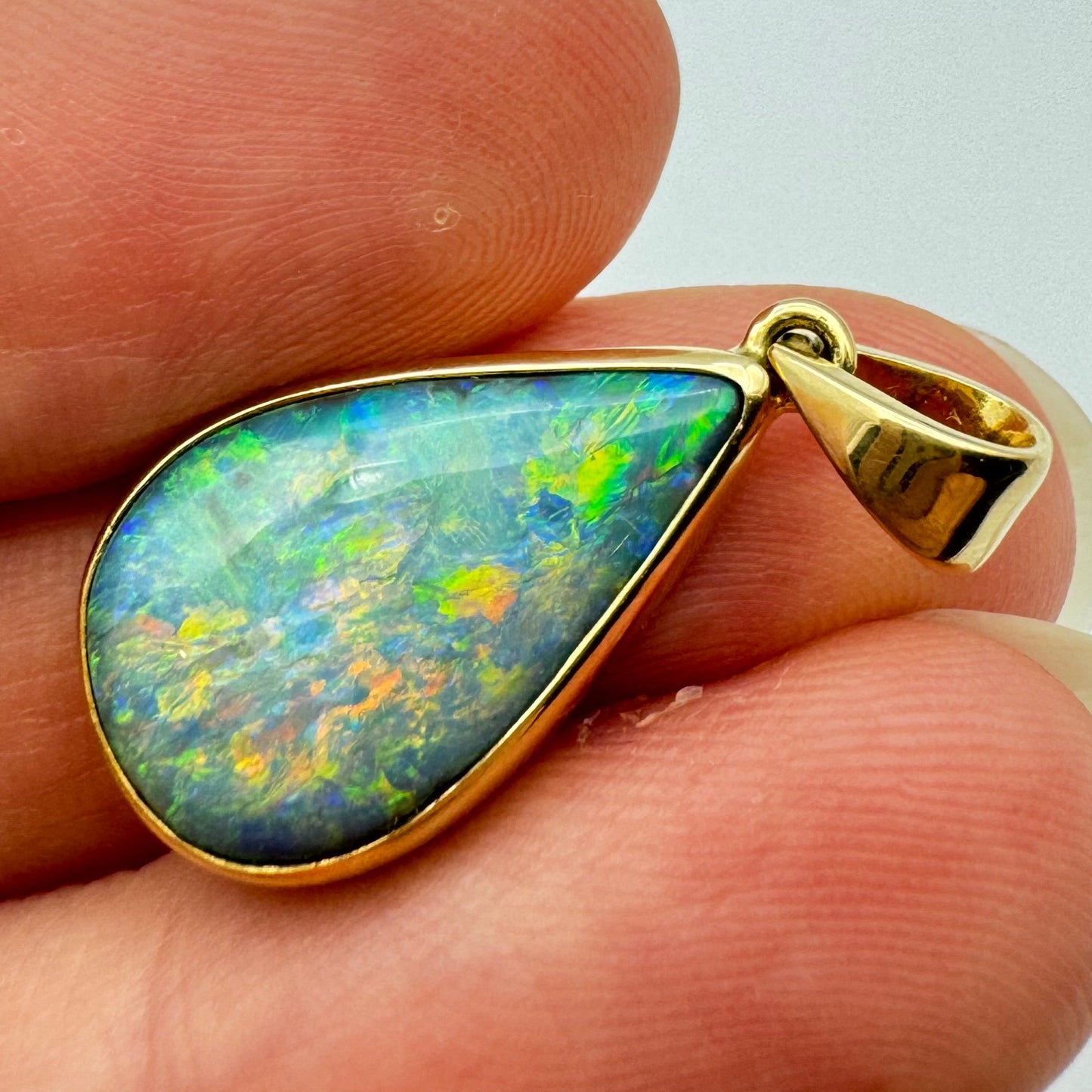 18k Gold Mintabie Black Opal Pendant