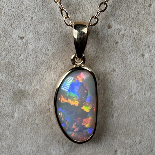 14k Gold Rolling Flash Crystal Opal Pendant