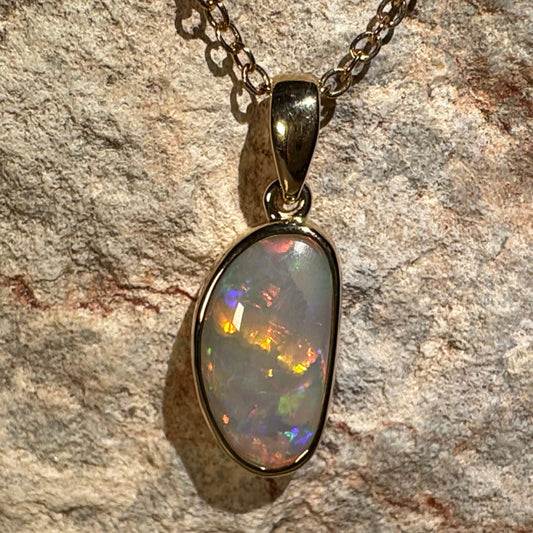 14k Gold Rolling Flash Crystal Opal Pendant
