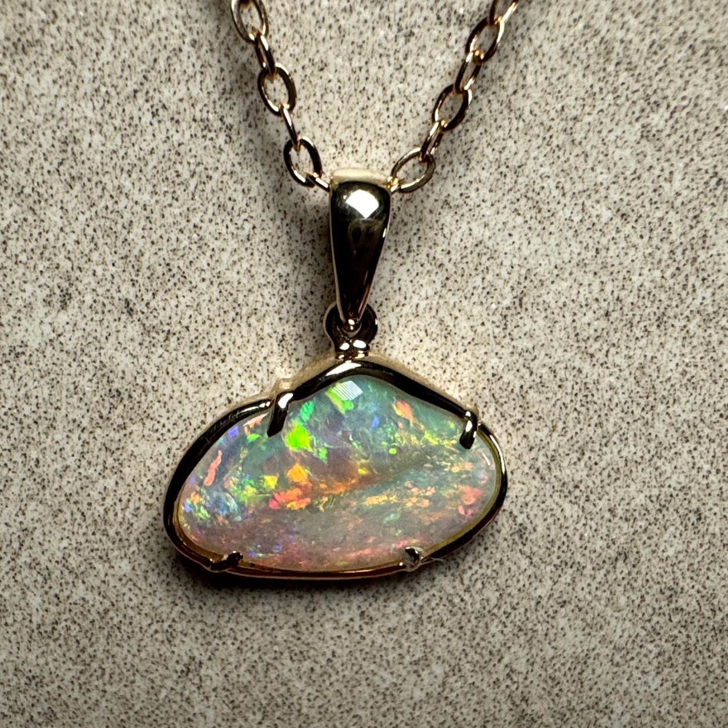 14k Gold Hand Carved Rainbow Mintabie Crystal Opal Pendant