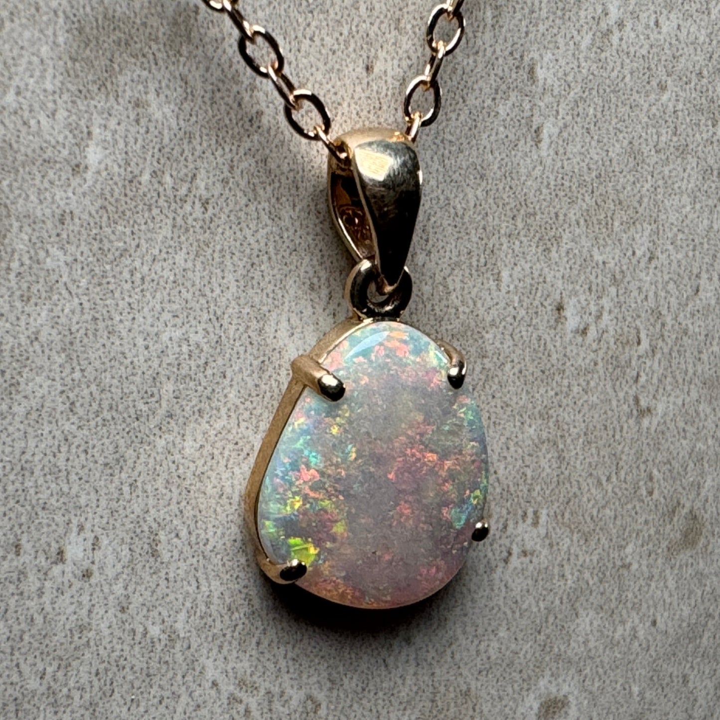 9k Gold Claw Set Opal Pendant