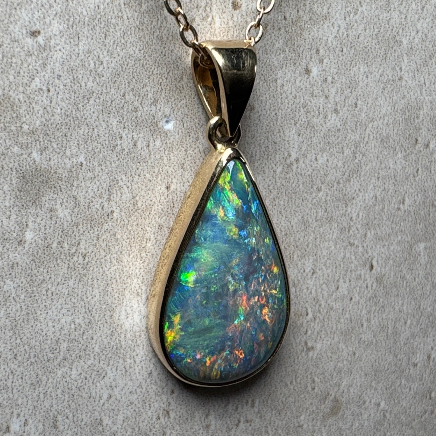 18k Gold Mintabie Black Opal Pendant