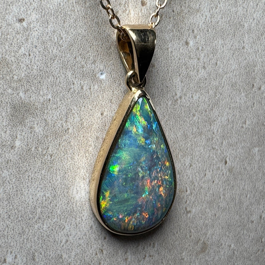 18k Gold Mintabie Black Opal Pendant