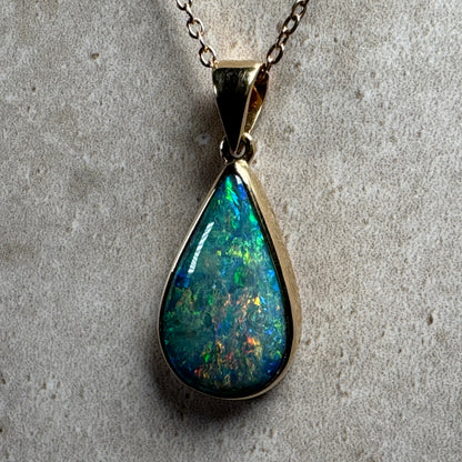 18k Gold Mintabie Black Opal Pendant