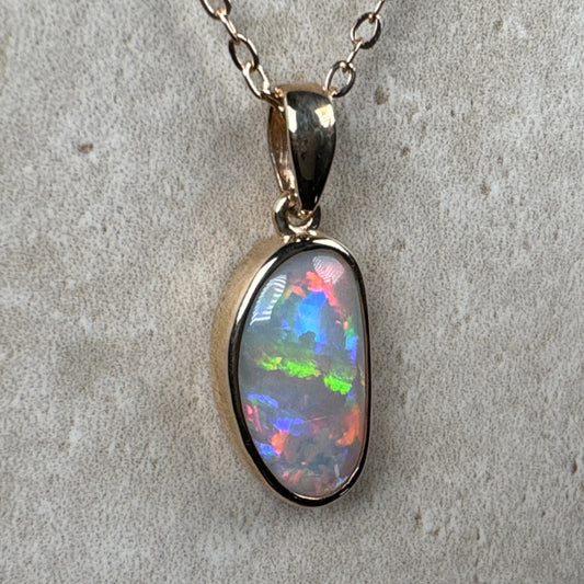 14k Gold Rolling Flash Crystal Opal Pendant