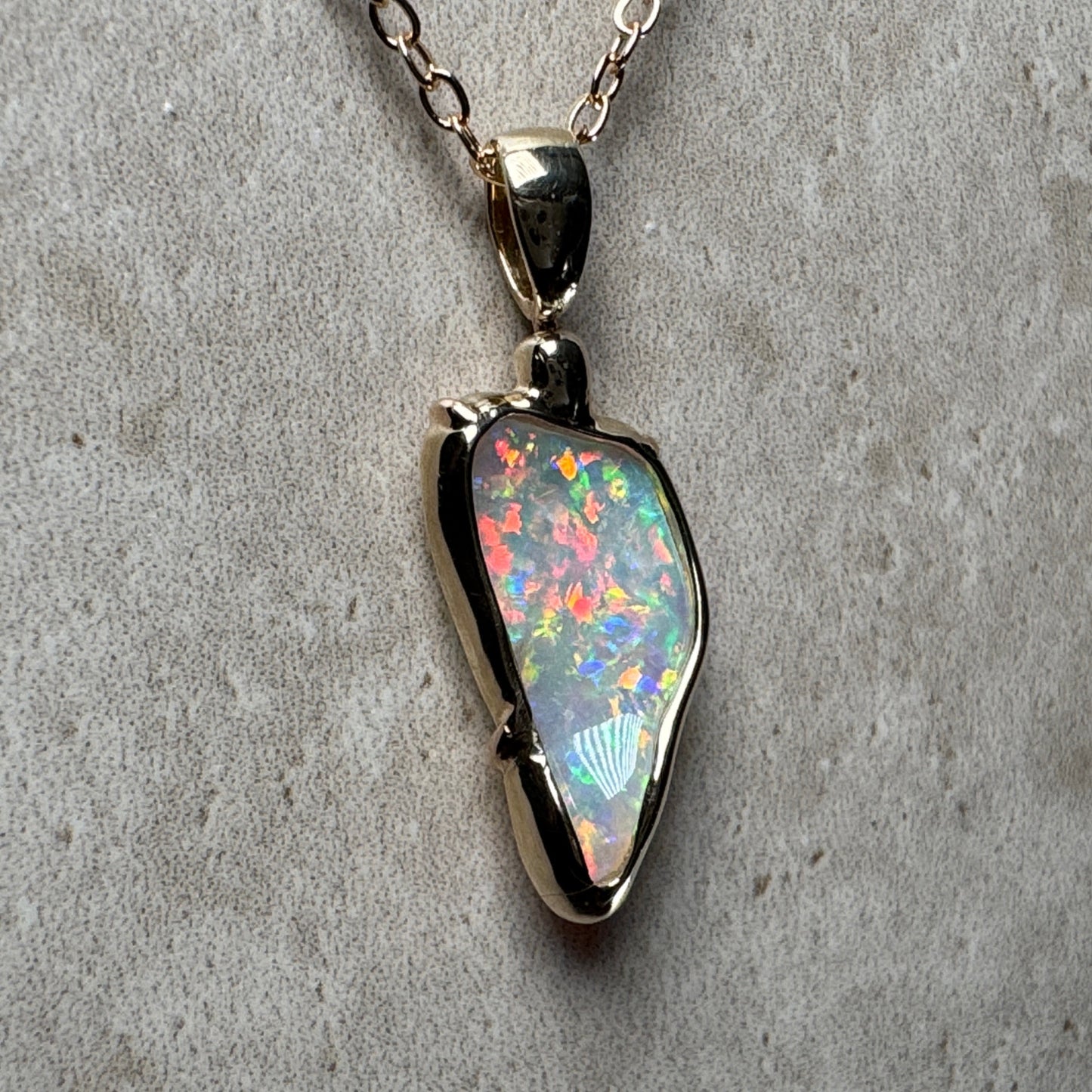 14k Gold Swivel Belemnite Crystal Opal Pendant