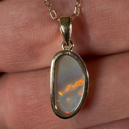 14k Gold Rolling Flash Crystal Opal Pendant